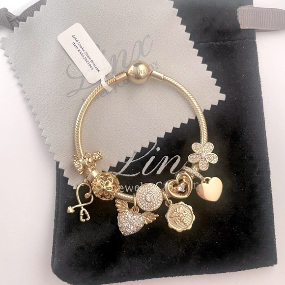Linx Yellow Gold Snake Chain Bracelet with Registered Nurse Themed Charms - Picture 4 of 9